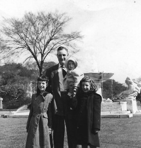 L to R: Eileen, Dad holding me, and Marilyn. 